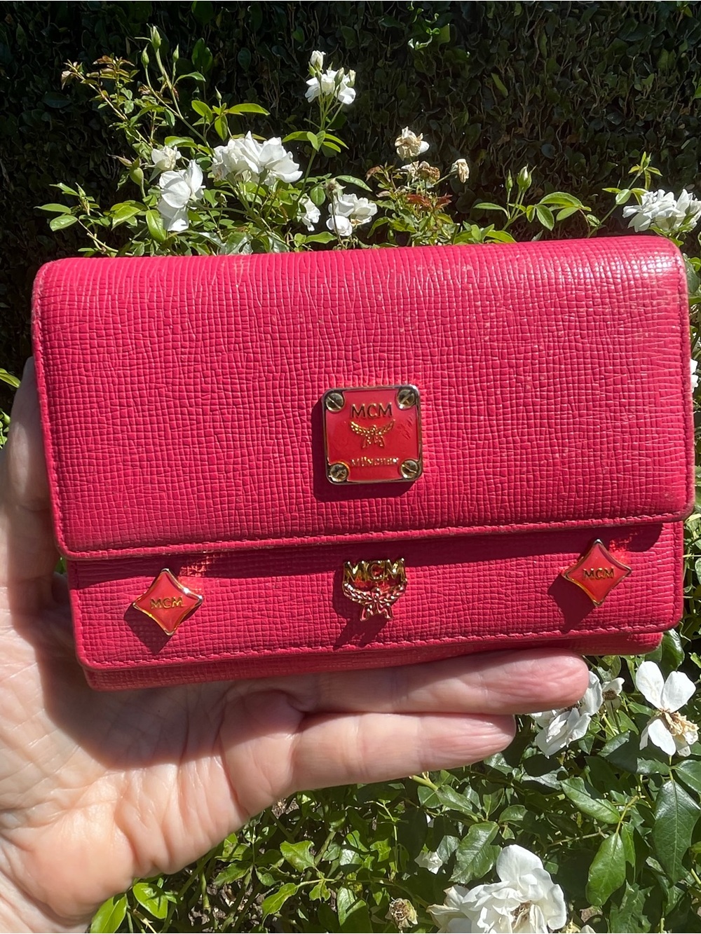 MCM Pink Leather Continental Wallet with Charm Accents & Gold Hardware”